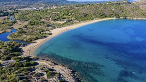 An aerial view of a coastal area with a clear blue sea, sandy beach, and surrounding greenery. - Studio apartment 2 beds, about 30 square meters, living room with kitchenette and single beds that can be joined together, bathroom with shower. Possibility of cot (with supplement). <br>Comfortably furnished apartments, they can be on the ground floor w (Palau)