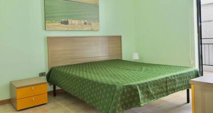 Two-room apartment for 4 people consisting of a living room with kitchenette, double or twin sofa bed, a double bedroom; bathroom with shower. <br>They can be on the ground floor or first floor. <br>Balcony or garden equipped with table and chairs. <br>C