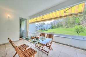 Family Apartment, Multiple Bedrooms, Refrigerator & Microwave, Mountainside (Residenza Parco Carona) | Outdoor dining