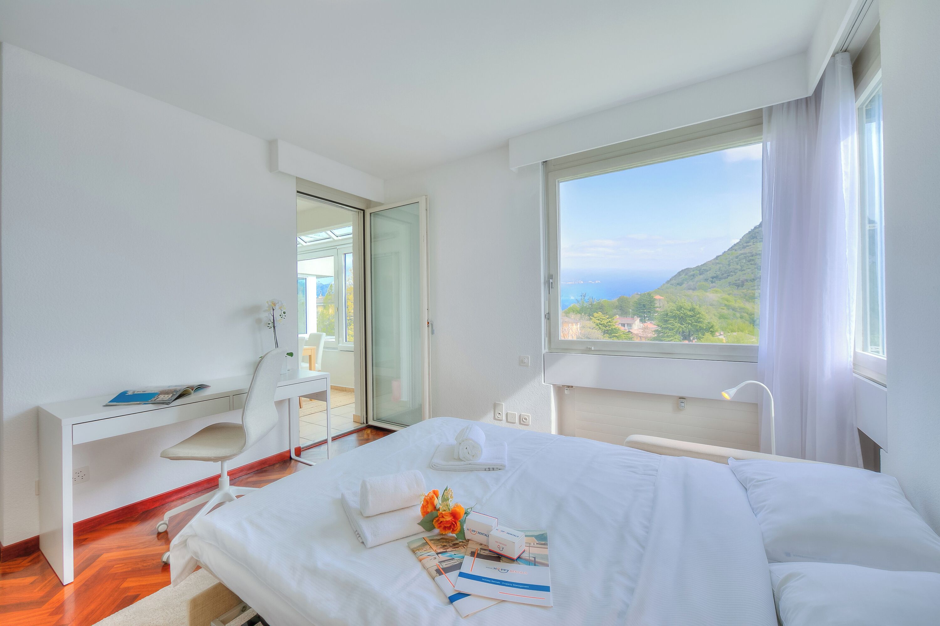 Family Apartment, Multiple Bedrooms, Refrigerator & Microwave, Mountainside (Residenza Parco Carona) | 2 bedrooms, laptop workspace, iron/ironing board, free WiFi