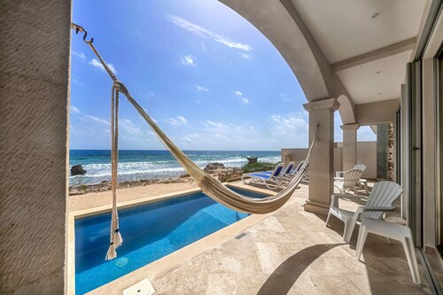 Steps to Sand- Serene Beachfront Getaway in Isla Mujeres, Mexico.