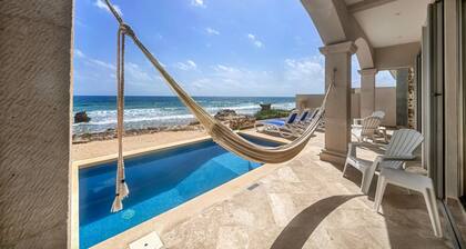 Steps to Sand- Serene Beachfront Getaway in Isla Mujeres, Mexico.