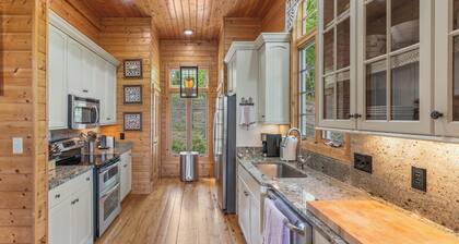Tree top is a 5-star mountain home with majestic views and easy lake access!
