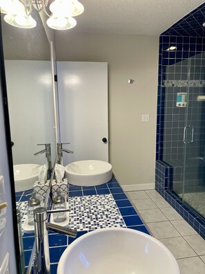 Combined shower/tub, hair dryer, towels, soap