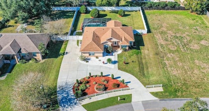 PRICE DROP!! • Equestrian Paradise w/ Swim Pool • 12 min to WEC • Great Location