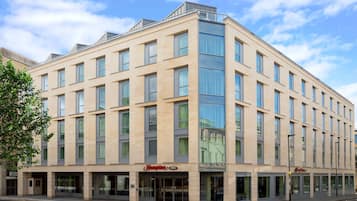 Hampton hotel features a contemporary design with a symmetrical facade and flat roof.