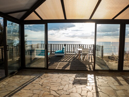 Villa avec véranda en front de mer vue exceptionnelle