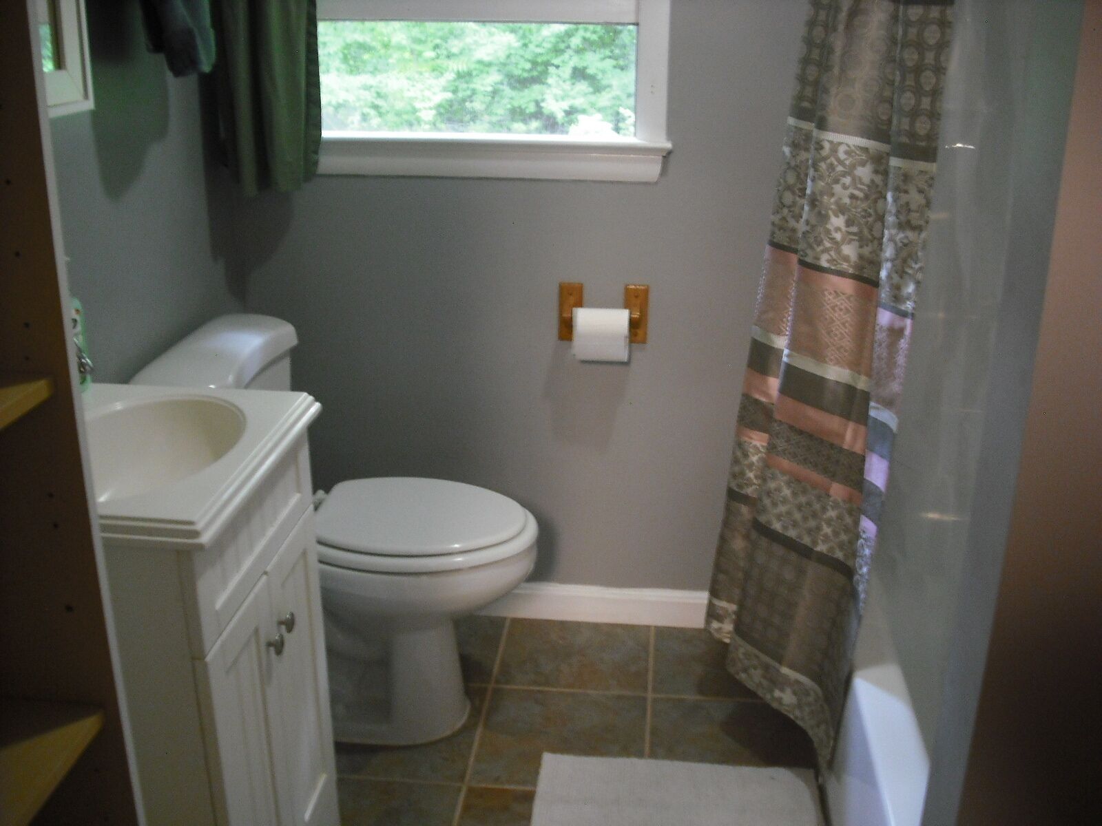 Combined shower/tub, hair dryer, towels, soap
