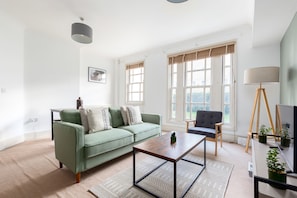 Apartment | Living area | 37-inch TV with cable channels, Netflix, streaming services