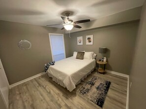 2 bedrooms, desk, blackout curtains, iron/ironing board