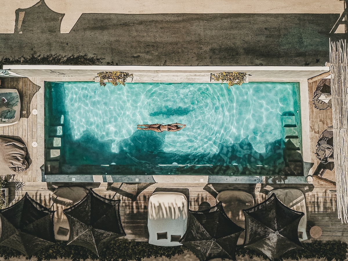 An aerial view of a swimming pool at Hotel El Nido Holbox