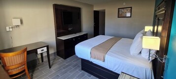 Cortinas opacas, tabla de planchar con plancha, wifi gratis