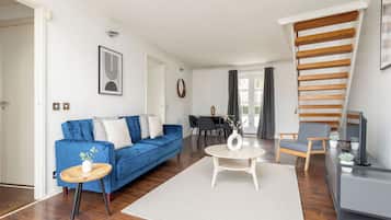 Appartement | Woonruimte | Een 37-inch televisie met kabelzenders, Netflix en streamingdiensten