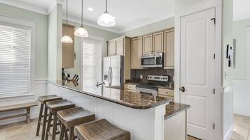 Coffee/tea maker, fridge, microwave, oven