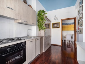 Executive Condo | Private kitchen | Full-size fridge, microwave, oven, stovetop