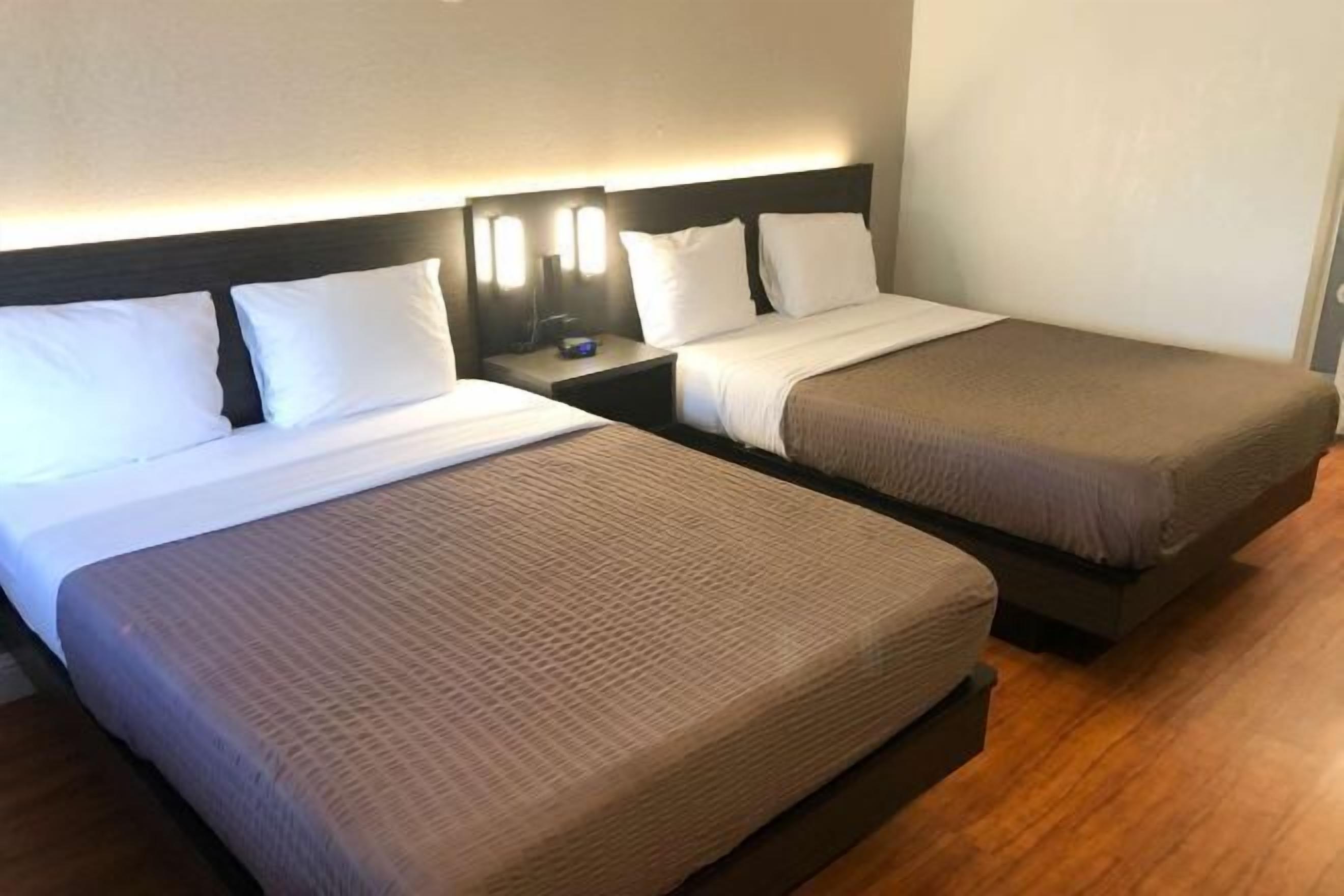 Memory foam beds, individually furnished, desk, blackout drapes