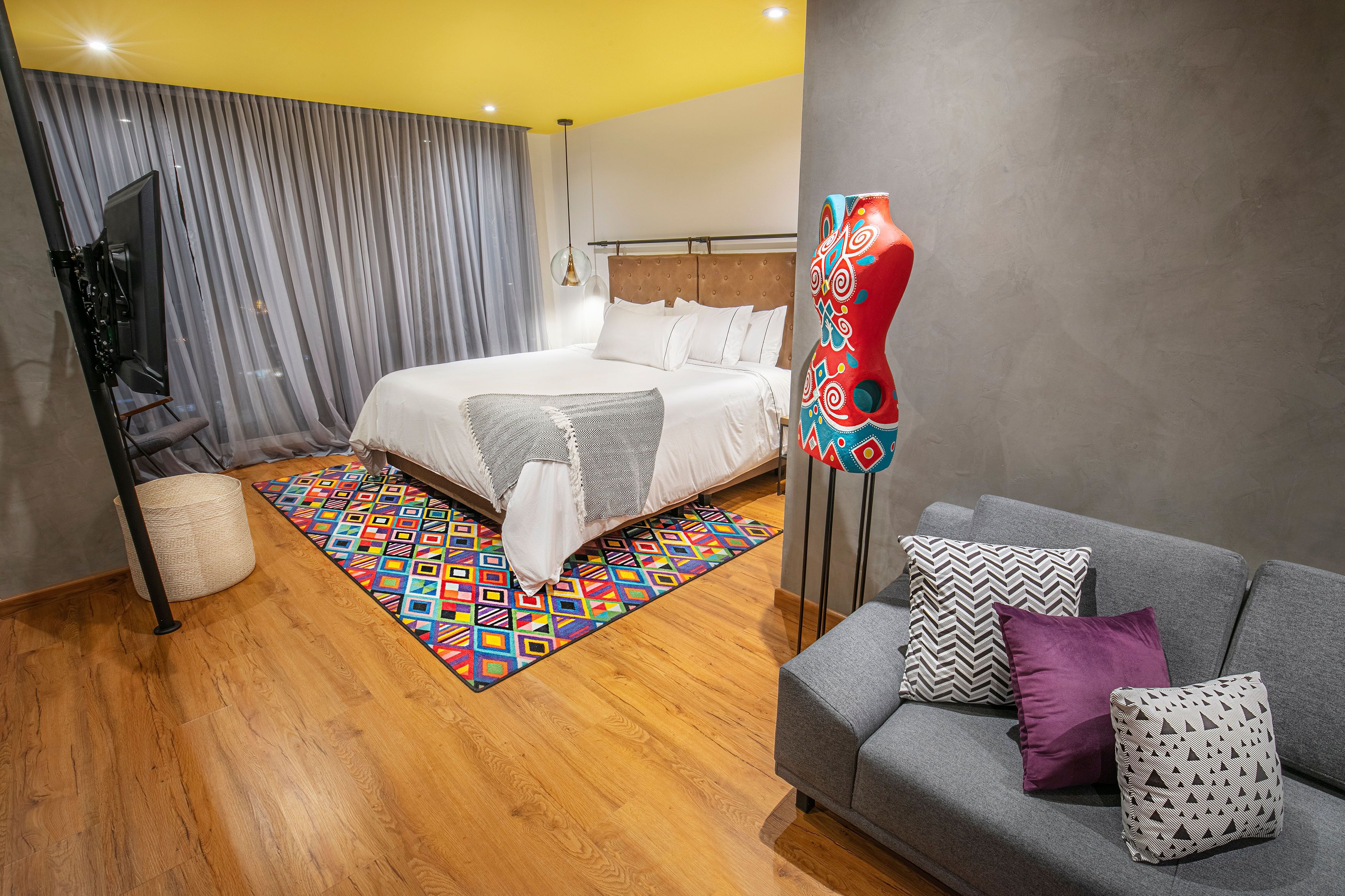 junior suite, 1 king bed | living area | flat-screen tv