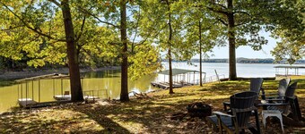 3 bedroom/2 full bath lakefront home with gentle slope to private covered dock