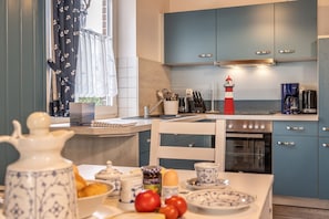 Unclassified image, 5 of 15, button - 50054 Holiday home Seefeuer - The semi-detached house with approx. 78sqm can accommodate up to 6 persons. (Wittmund)