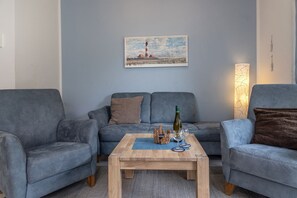 TV - Vacation home 50007 - pure comfort and relaxation: the semi-detached house with (Wittmund)
