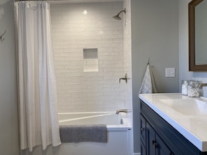 Combined shower/tub