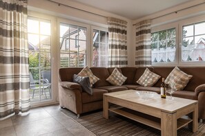 Unclassified image, 5 of 11, button - 50038 "Gleich am Deich" - Modern and quiet: The modernly furnished (Wittmund)