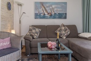 Télévision, cheminée, lecteur de DVD