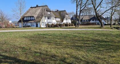 Comfortable country house on the lagoon in a quiet village and vacation complex - Das Landhaus