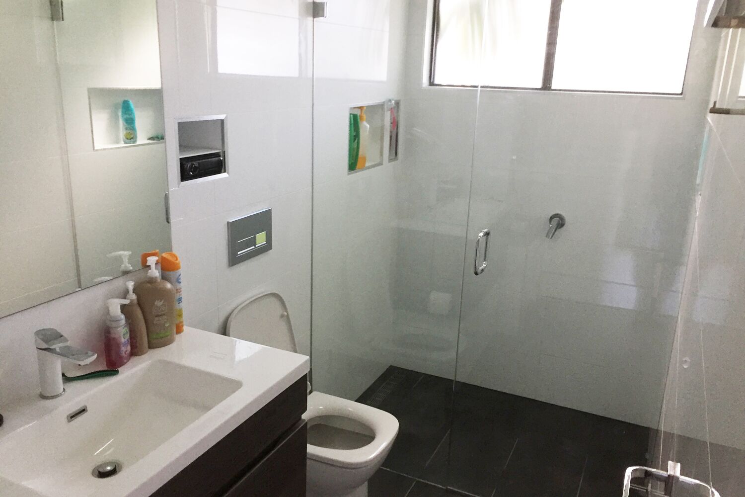 Shower, towels, soap, toilet paper