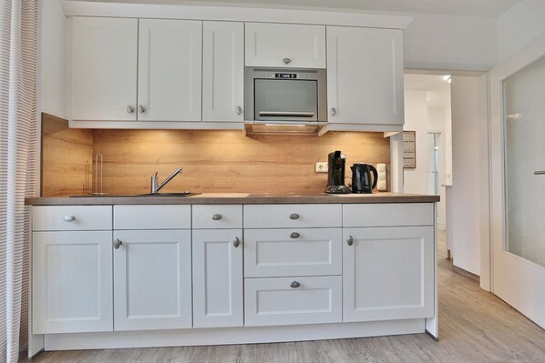 Imagen sin descripción, 1 de 25, botón