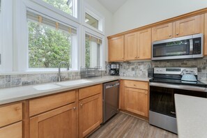 Fridge, microwave, oven, stovetop - 1323 - Sound Sunsets Corolla, NC 5 bed 5.5 bath, private pool, game room (Corolla)