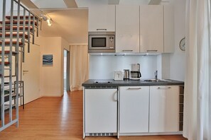 Refrigerador, microondas, parrilla de estufa y lavavajillas 