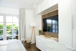 1 slaapkamer, een strijkplank/strijkijzer, wifi