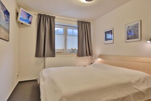 2 habitaciones, tabla de planchar con plancha y wifi