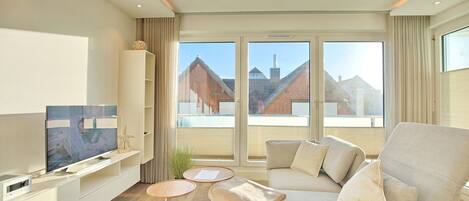 Una televisión, un reproductor estéreo