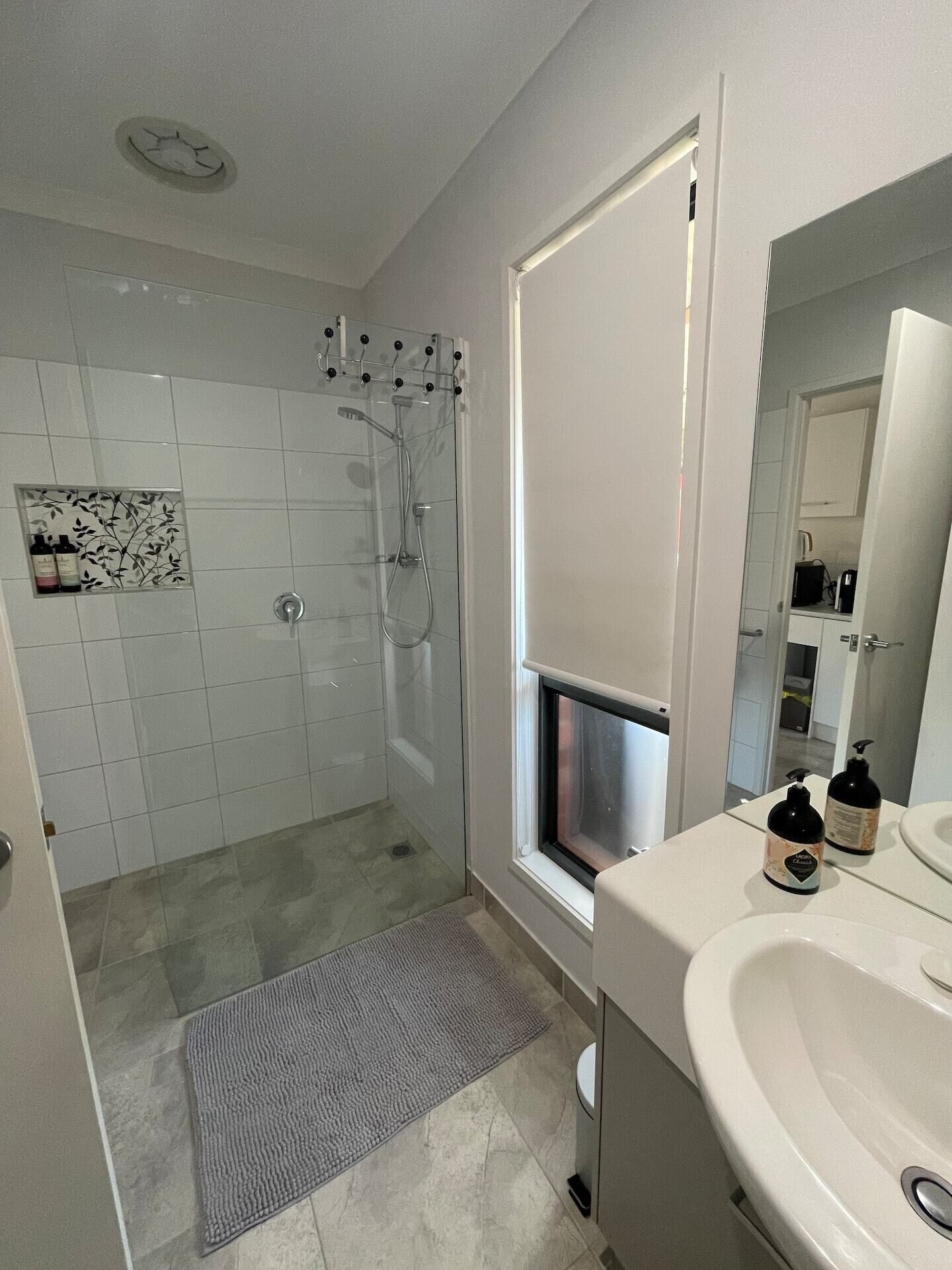 Shower, eco-friendly toiletries, hair dryer, towels