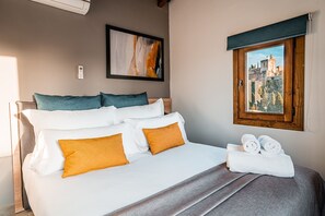 2 habitaciones y tabla de planchar con plancha 