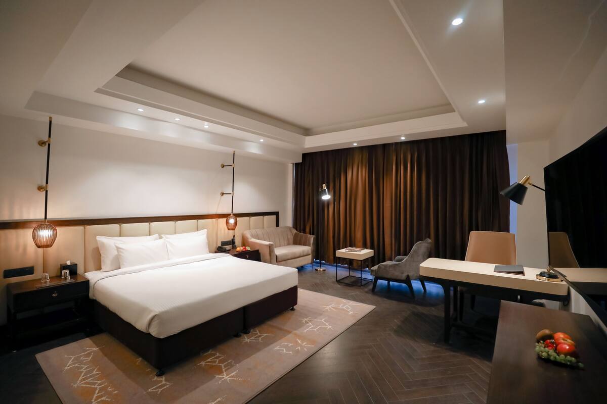 In-room safe, desk, laptop workspace, iron/ironing board