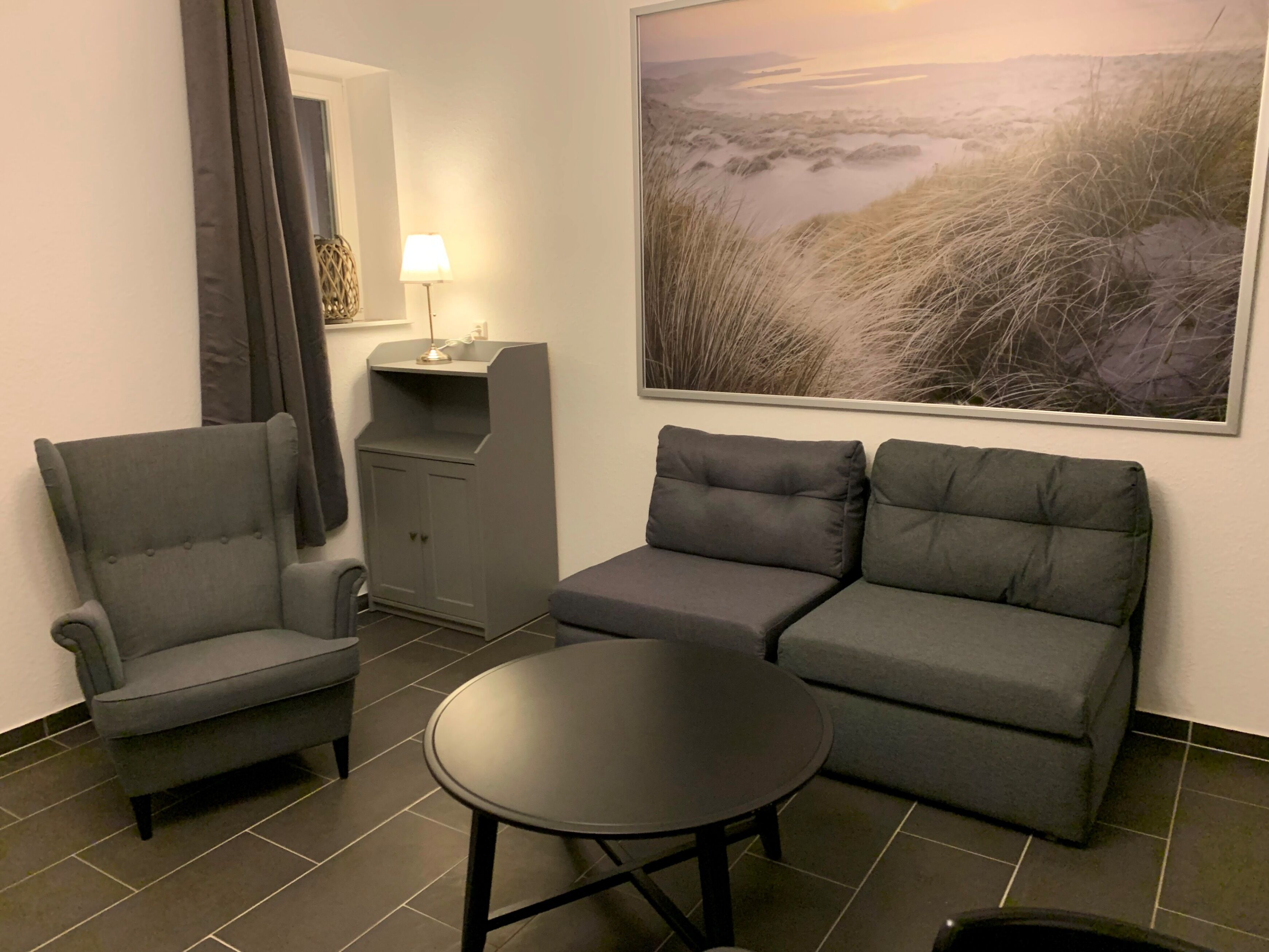 Comfort Condo | Living area | 32-inch flat-screen TV with satellite channels, TV