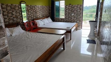 Family Quadruple Room, Multiple Beds, Garden View | Pillowtop beds, desk, soundproofing, free WiFi