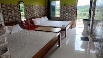 Family Quadruple Room, Multiple Beds, Resort View | Pillowtop beds, desk, soundproofing, free WiFi