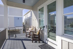 Relax on the deck with comfortable seating and a secure railing.