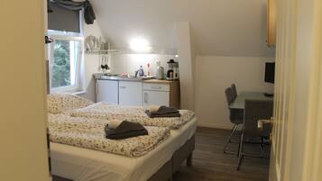 Classic-Apartment | Wohnbereich | 32-Zoll-Flachbildfernseher mit Satellitenempfang, Fernseher