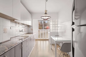 Microwave, toaster, cookware/dishes/utensils