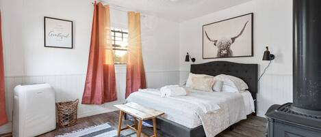 1 bedroom, desk, iron/ironing board, travel crib