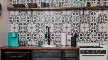 Fridge, stovetop, coffee/tea maker, cookware/dishes/utensils