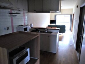 Fridge, microwave, stovetop, cookware/dishes/utensils