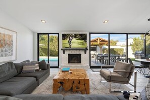 Smart TV, fireplace, books