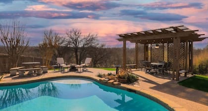 Elite 4BR/2B Home with Hot Tub, Pool, and BBQ