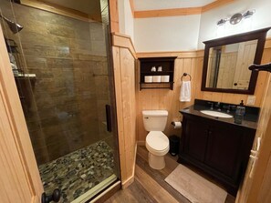 Combined shower/tub, hair dryer, towels, soap